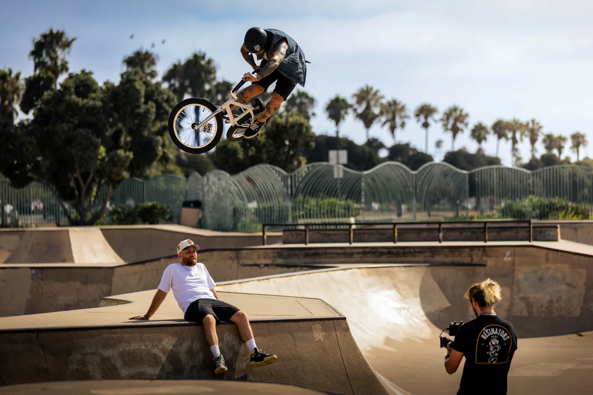 A BMX rider in the air above a San Diego skatepark, from Raye Sundaze — Summertime